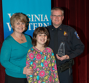 Chief Craig S. Harris (right) with wife and daughter