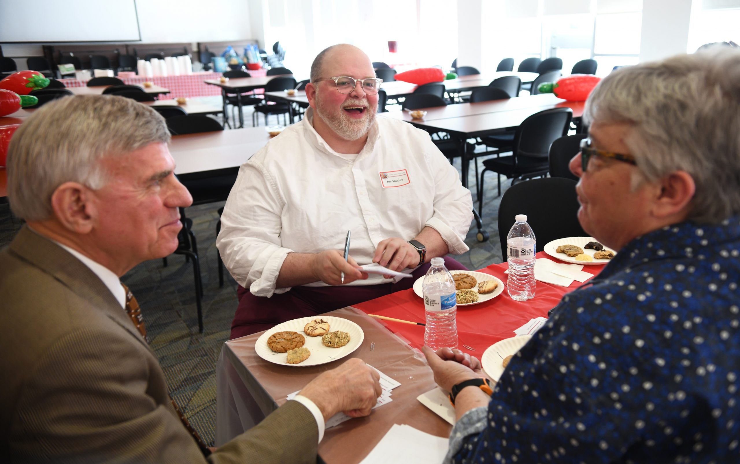 Dr. Sandal and others at Chili Cookoff