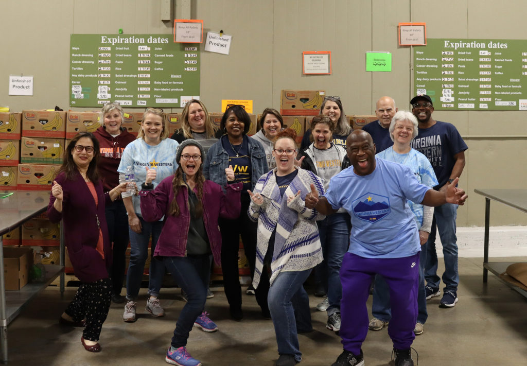 Volunteering in the afternoon shift at Feeding Southwest Virginia were (from left): front row, Mallory White, Emerald Bates, James Andrews; middle row, Aliya Khan, Melissa Williams, Vernese Smith, Heather Butler, Leah (Beth) Edwards; back row, Kathy Smith, Jenni Underwood, Lisa Ridpath, Crystal Hall, Barry (Crystal's dad) and Alexander Scott.