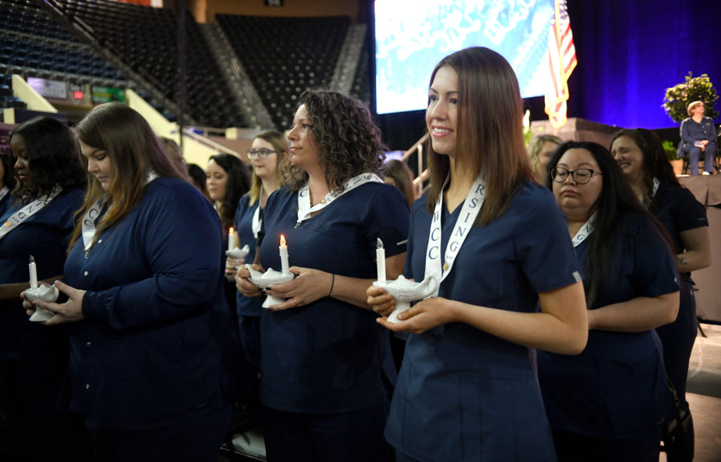 The 2022 cohort of Virginia Western's Nursing Program is honored during the Pinning Ceremony on May 13, 2022, at the Berglund Center. The 2022 graduates were the first to undertake a coaching program to prepare for the NCLEX, a requirement to become a Registered Nurse.