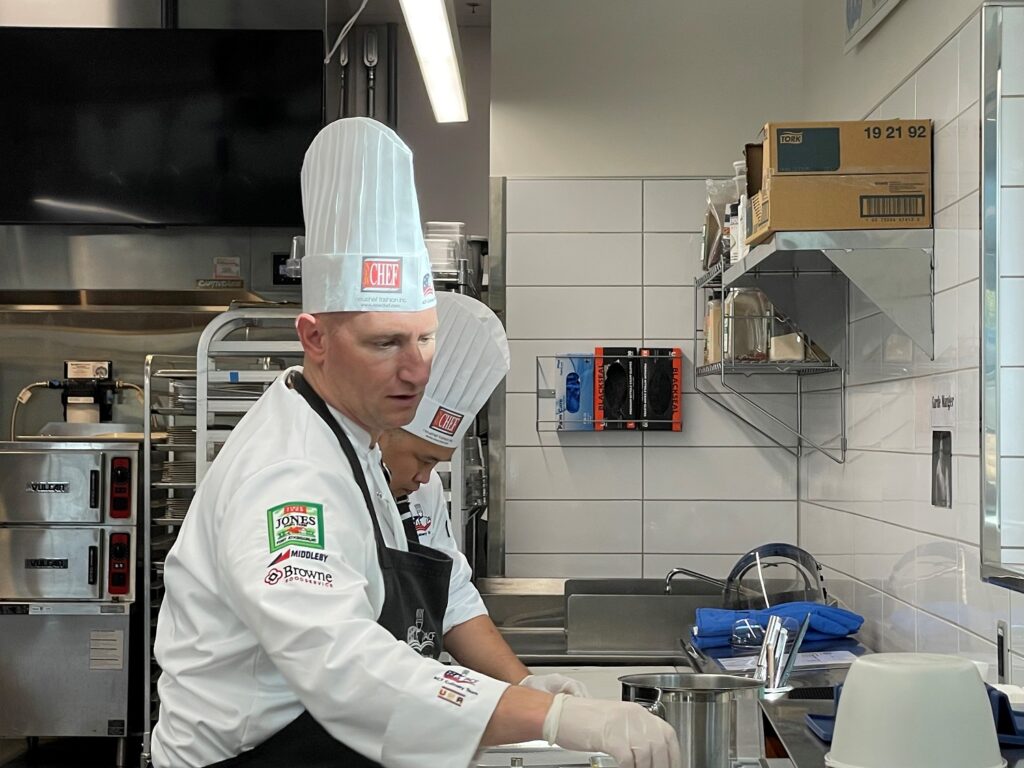 Chef Ted Polfelt, Team USA member and a full-time faculty member at Virginia Western, works during the rehearsal Monday, Nov. 6, as Chef Troman Felizmenio works beside him.