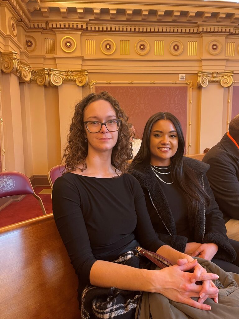 Whitney Young (left) and Briana Wood observe Virginia's state Senate during their visit to the General Assembly.