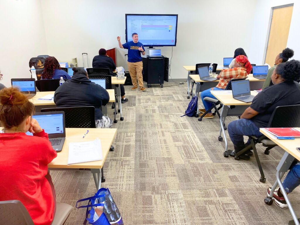 Brittany Boltinghouse, Program Coordinator for Workforce Solutions at Virginia Western Community College, leads a class at the EnVision Center. Photo courtesy of RRHA.