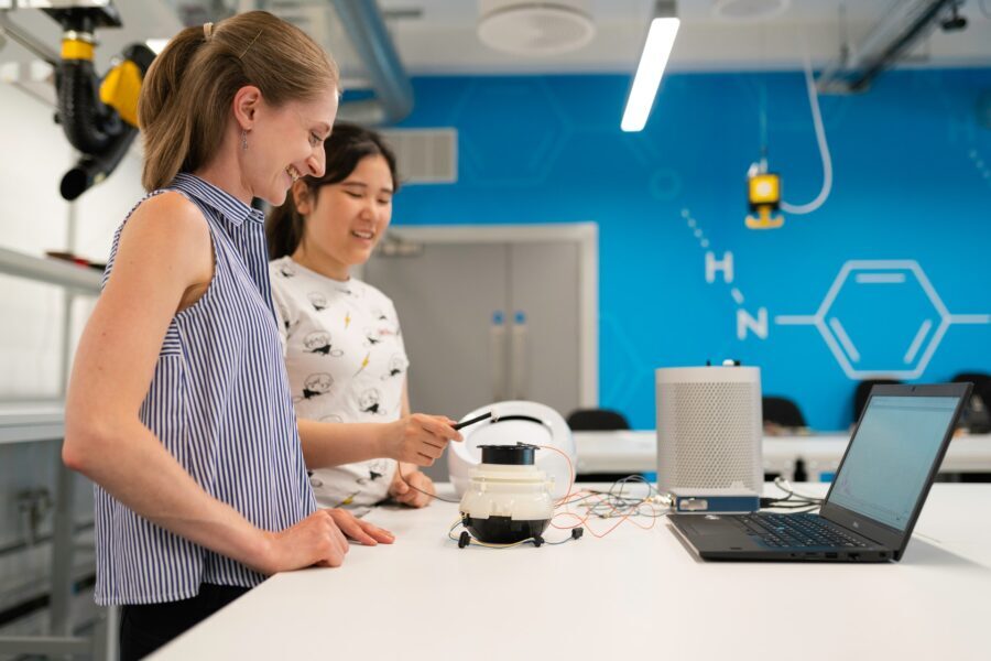 two female engineers working on an electronics project