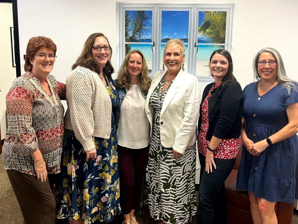Dr. Treanor (fourth from left) with the Human Resources team