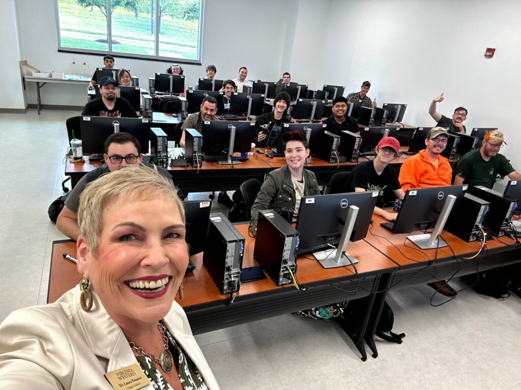 Dr. Treanor and students in a computer lab