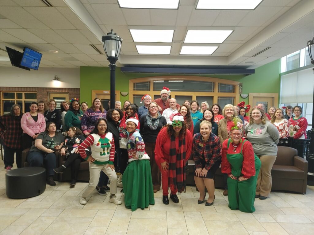 Dr. Treanor with Virginia Western staff at a holiday gathering